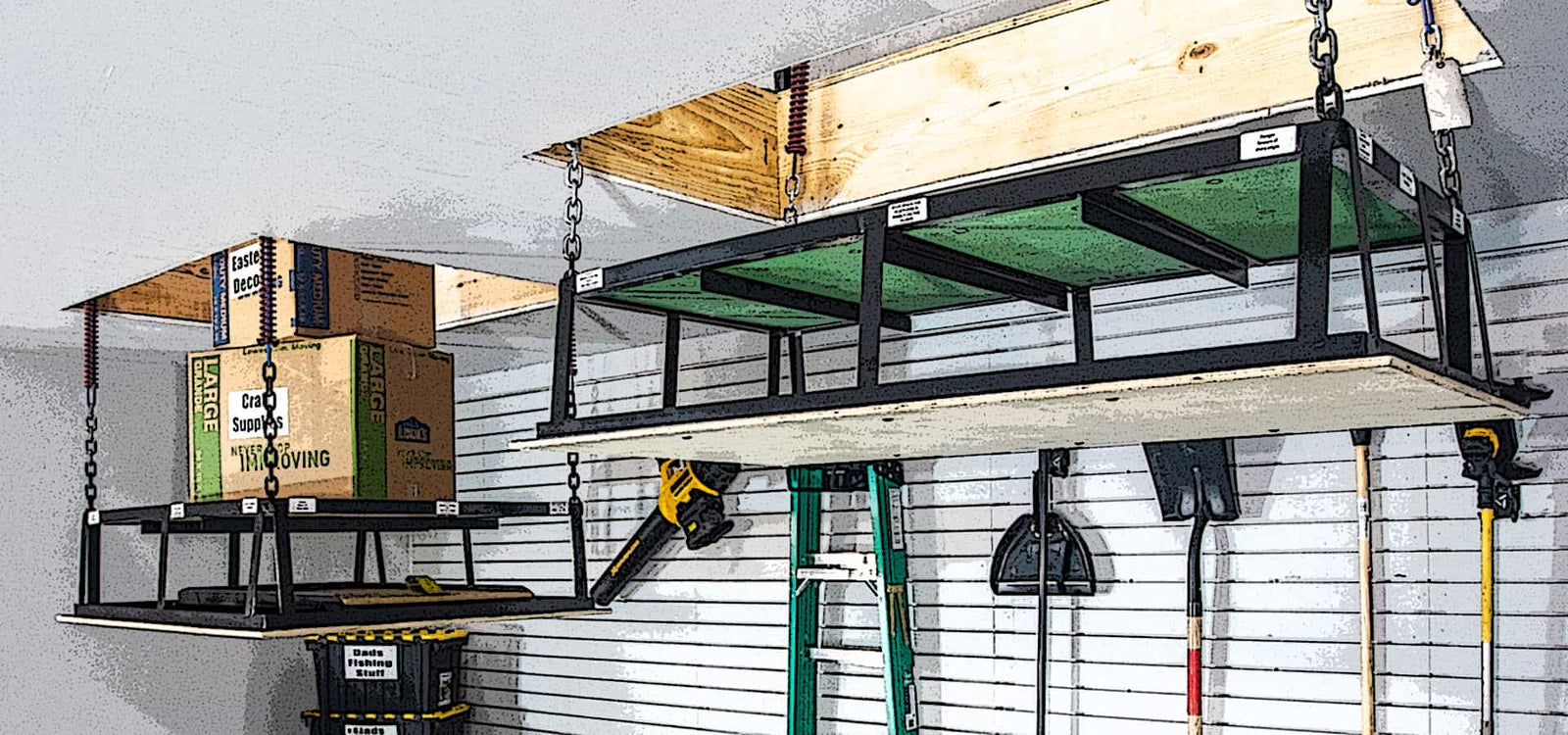 The Attic Lift Two Platforms Decending In Garage - Tools On Slat Wall Behind