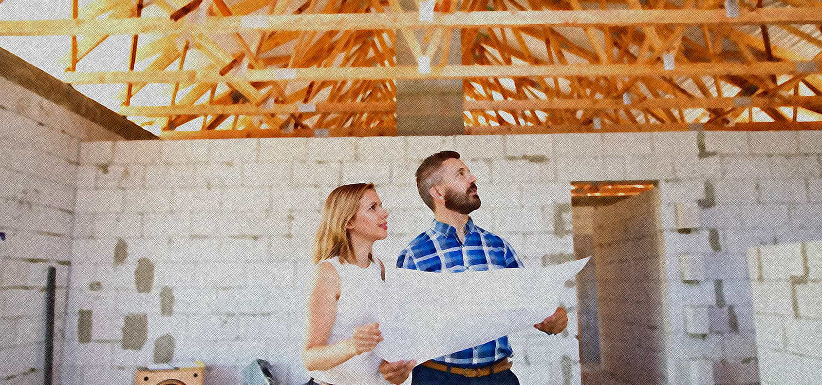 Woman and Man Holding Plans Looking Up At Roof Trusses