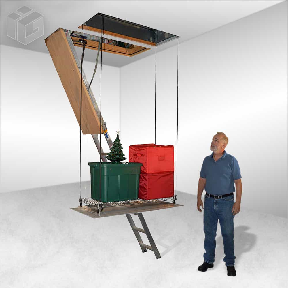 SpaceLift motorized attic storage lift with lowered platform holding Christmas decorations and storage totes. This electric attic elevator transports seasonal decorations and stored items safely between the attic and the floor below.