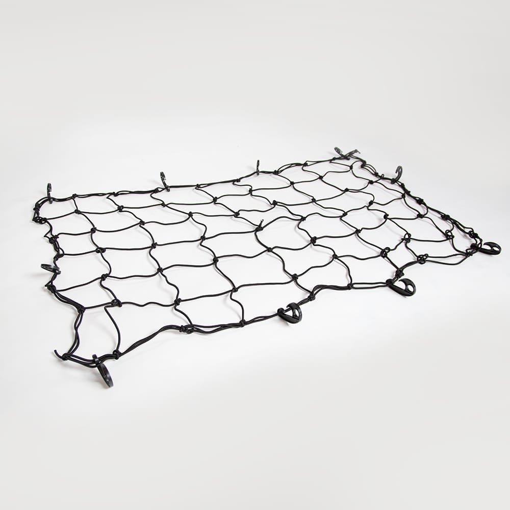 A Black Cargo Net Spread Out On A Plain White Background