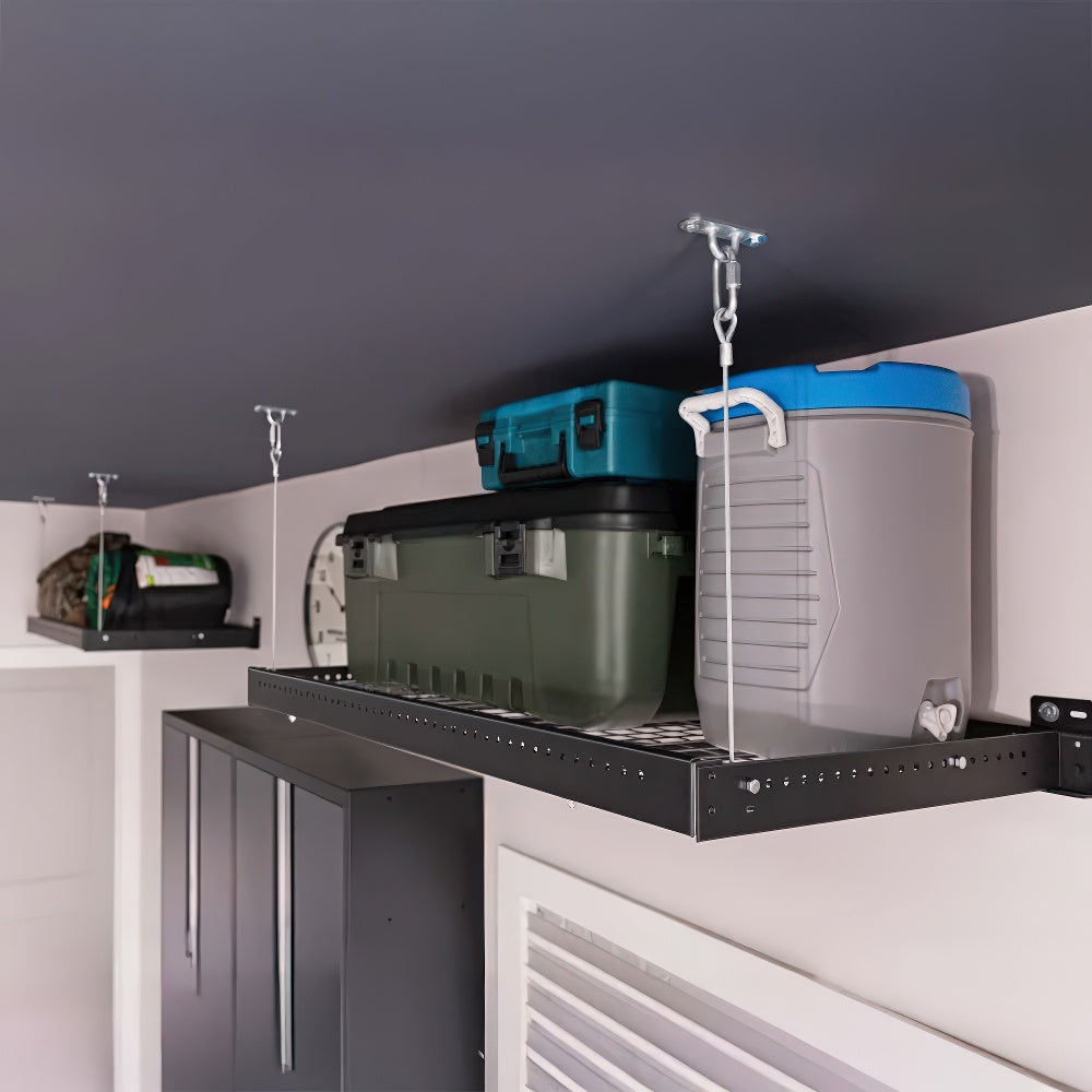 A Ceiling-Mounted Storage Rack Holds Large Containers And A Cooler Above Sleek Gray Cabinets In A Well-Organized