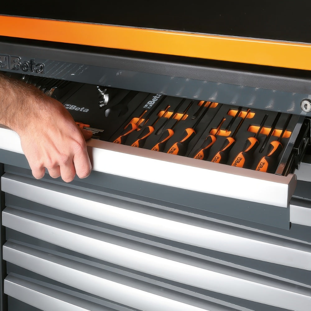 A Hand Pulls Open A Gray Beta Tool Cabinet Drawer Revealing Orange And Black Screwdrivers