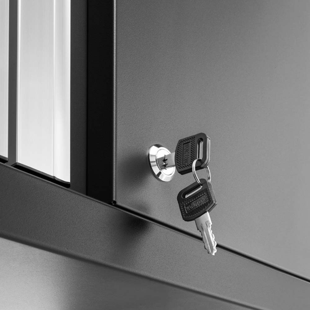 A Lock With Two Keys Inserted Into It Mounted On A Sleek 7 Piece Bold 3.0 Series Garage Cabinet Set