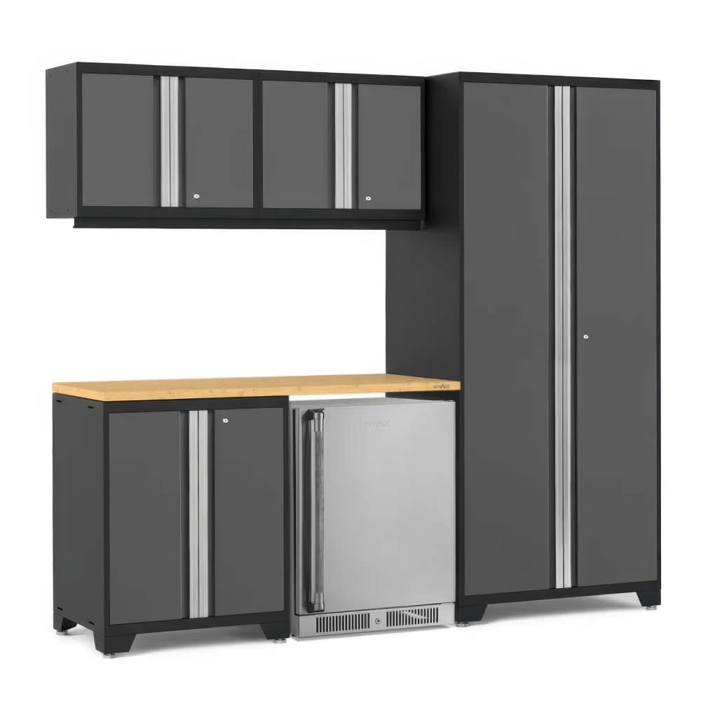 A Modular Garage Cabinet Set Features A Tall Locker Upper Wall Cabinets A Wood Worktop And An Undercounter Stainless Beverage Fridge