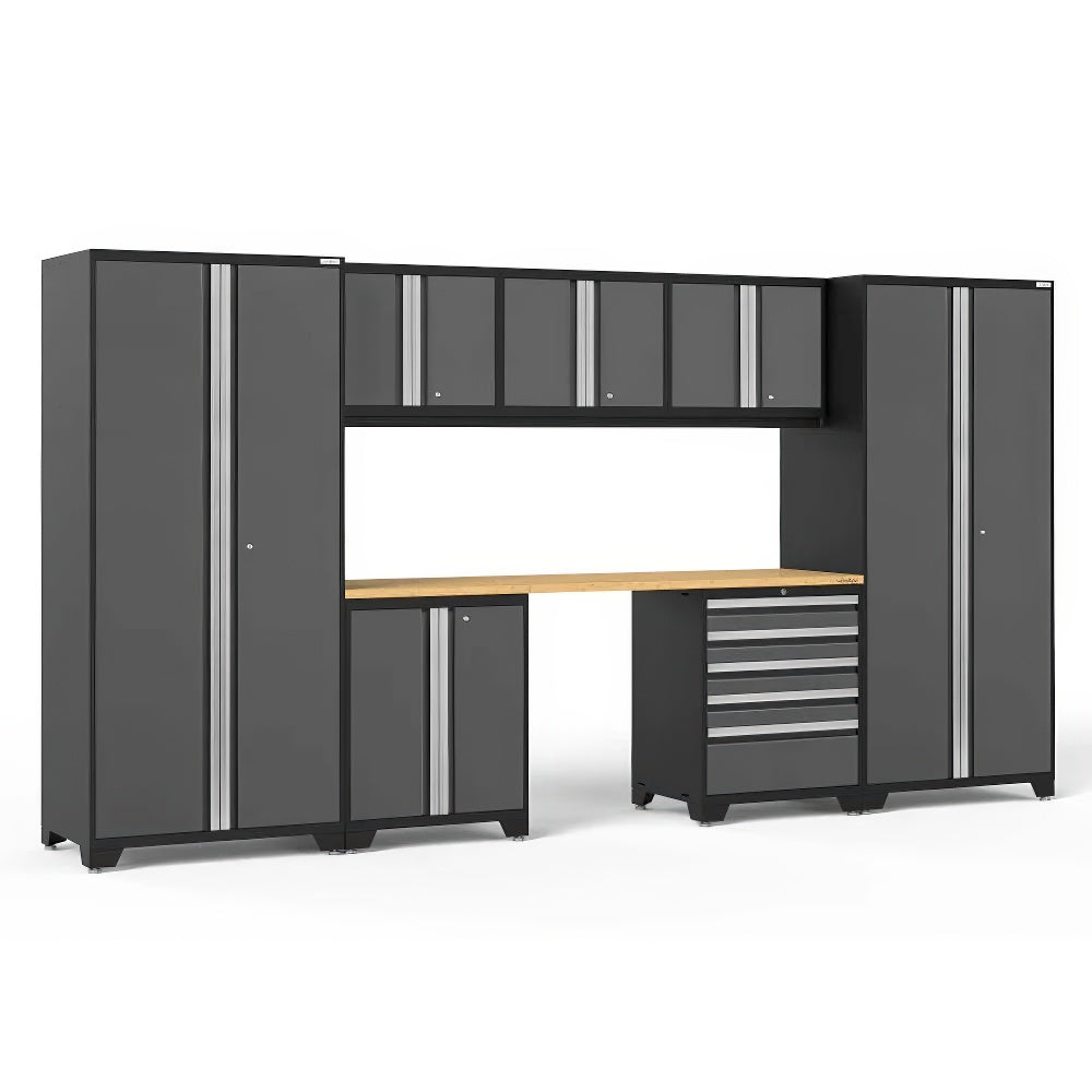 A Modular Garage Cabinet System With Tall Lockers Upper Wall Cabinets Base Units And A Wooden Worktop