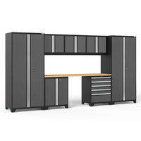 A Modular Garage Cabinet System With Tall Lockers Upper Wall Cabinets Base Units And A Wooden Worktop