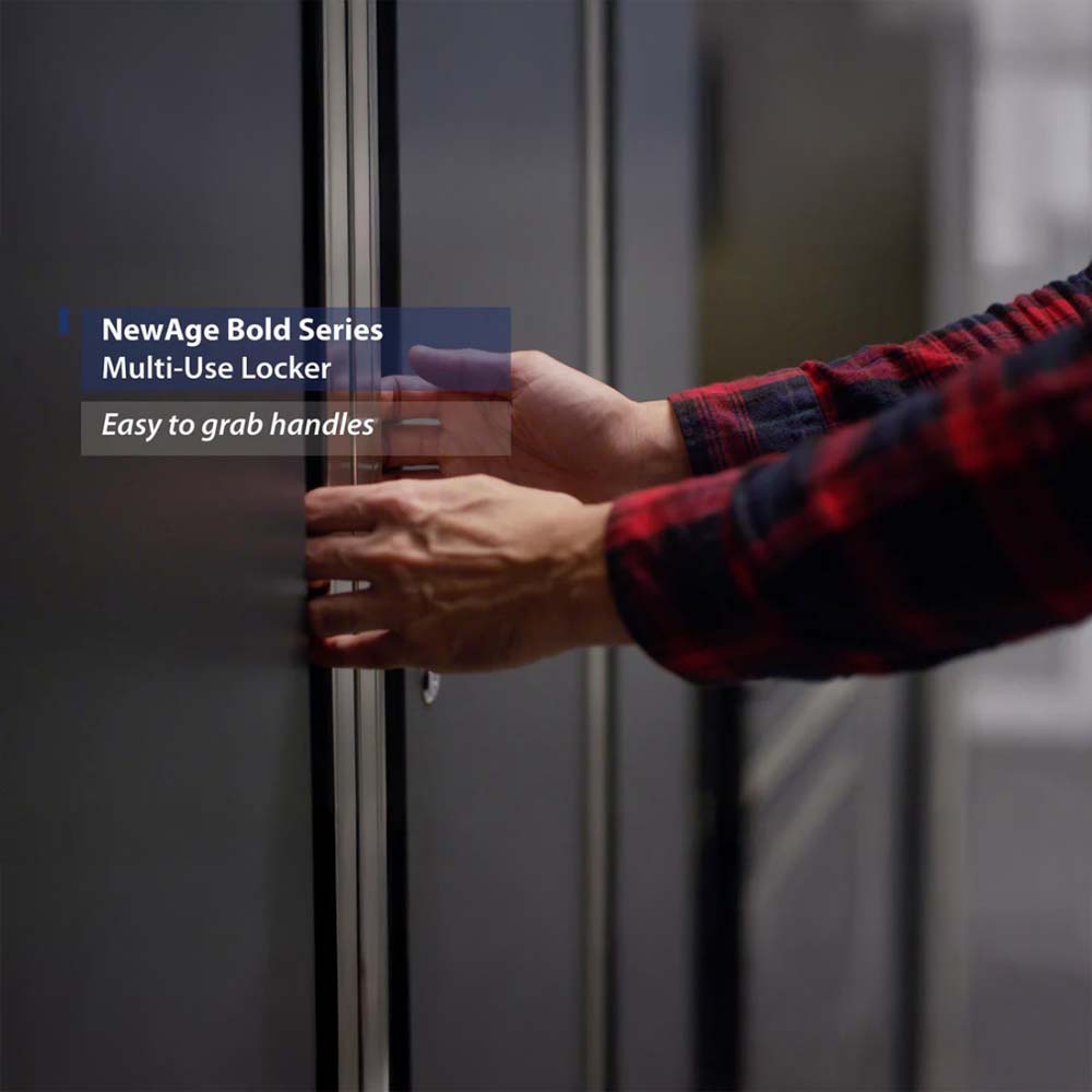A Person In A Red Plaid Shirt Reaching To Open A Dark-Colored Cabinet Using A Vertical Metallic Handle