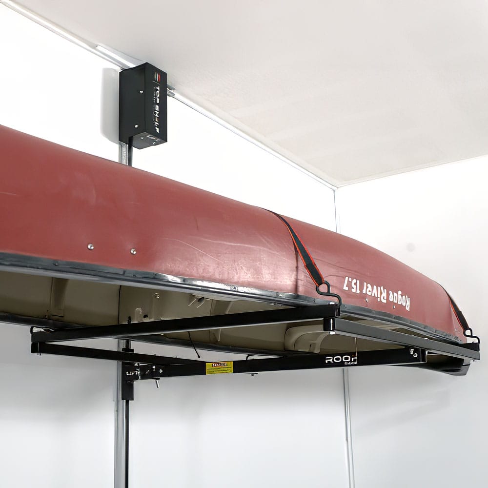 A Red Canoe Elevated On Garage By Top Shelf Storage Overhead Rack Within A Garage