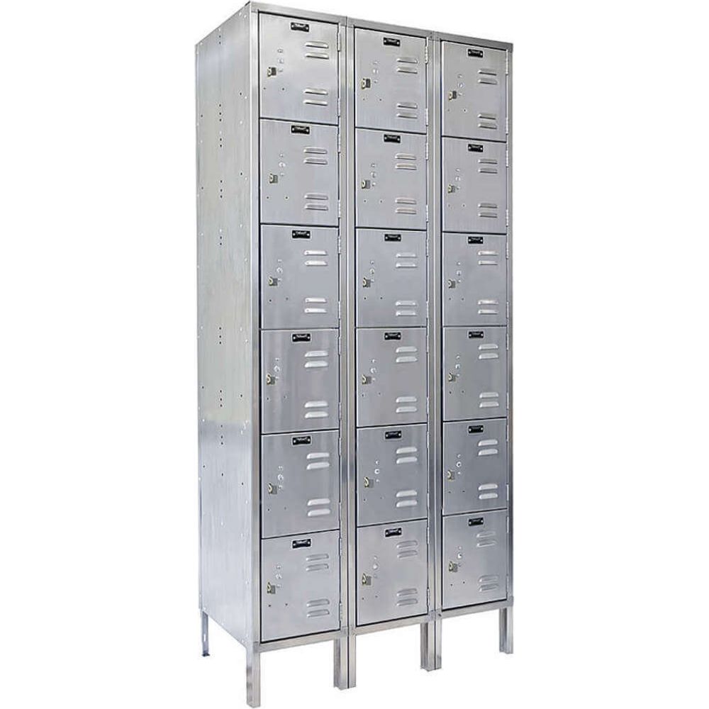 A Set Of Hallowell Assembled Stainless Steel Locker Each With Multiple Compartments Stacked Vertically