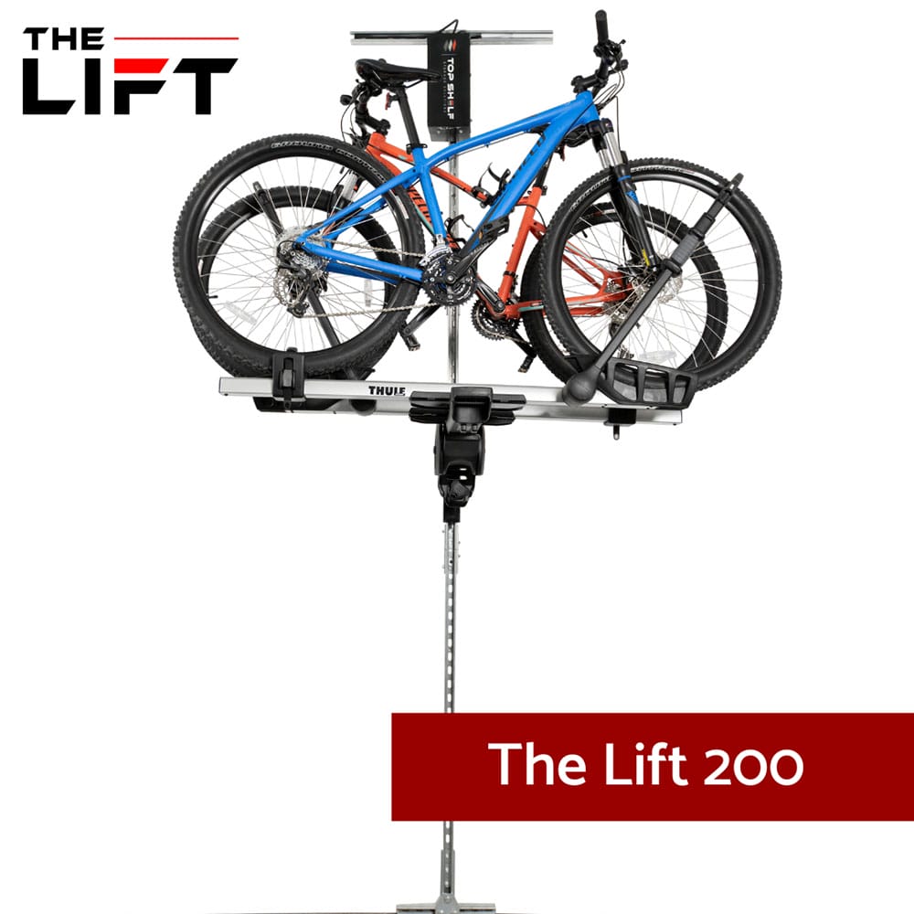 A Storage System Called The Lift 200 Featuring A Mechanical Lift With Two Bicycles Securely Hoisted And Aligned
