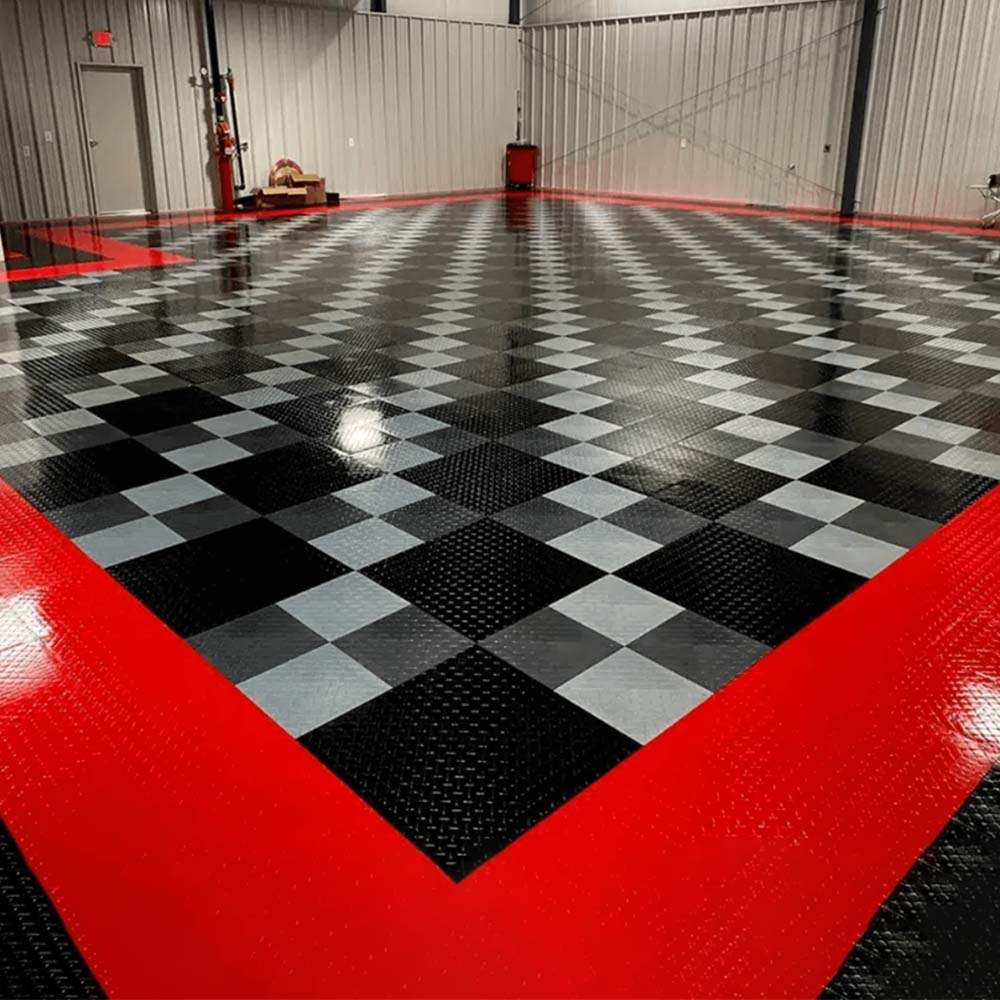 A Workshop Featuring A Glossy Black And Gray Checkered Racedeck Tuffshield With A Bold Red Border