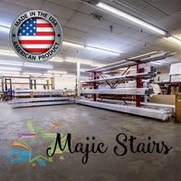 An Industrial Warehouse With Metal Beams And Materials For Majic Attic Stair Case Featuring A Made In The USA Badge