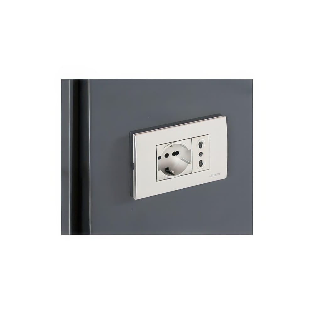 Angled Cream Power Socket Module On A Dark Gray Workshop Panel 