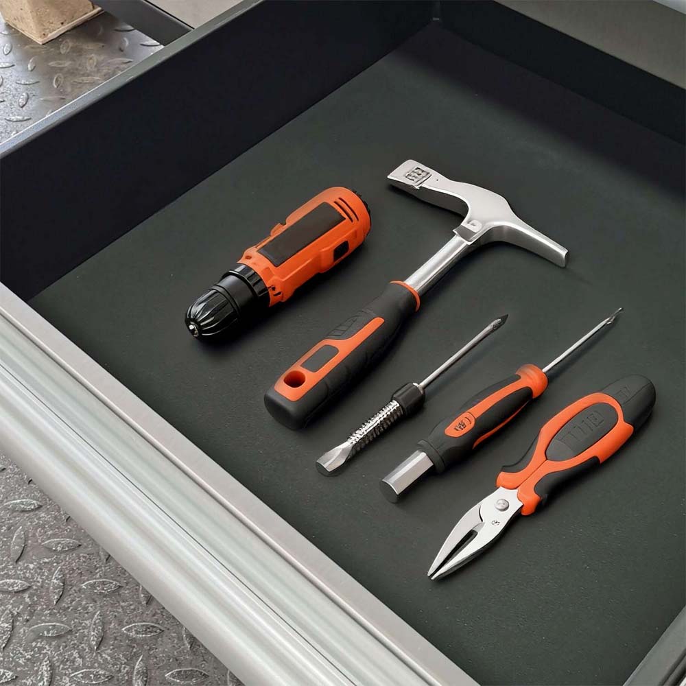 Assorted Hand Tools Lie On A Black Drawer Liner Inside An Open Toolbox Drawer