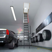 Attic Ladder Extended Down Into A Well-Organized Garage With A Parked Pickup Truck