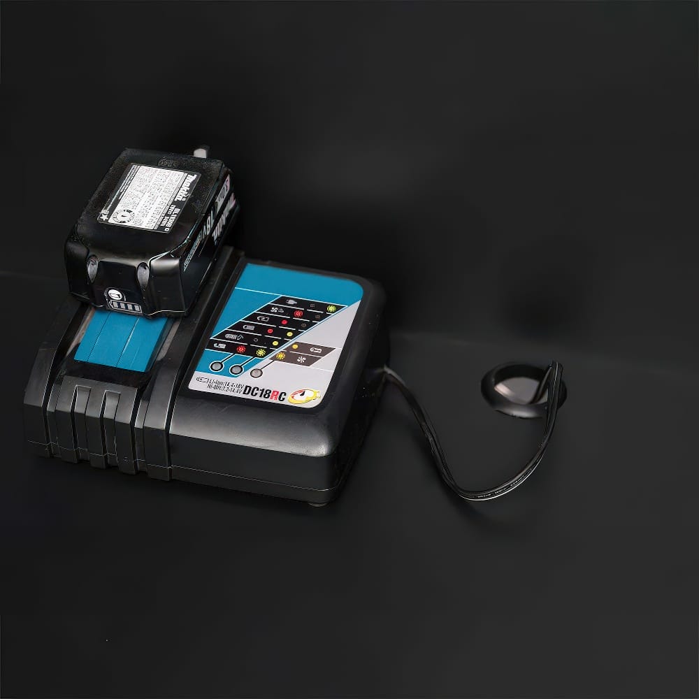 Battery Charger With Attached Rechargeable Battery On A Black Background