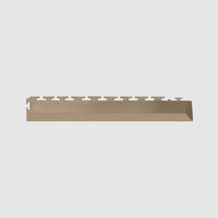 Beige Perfection Tile Interlocking Floor Tiles Corner With Evenly Spaced Notches Along The Top Edge
