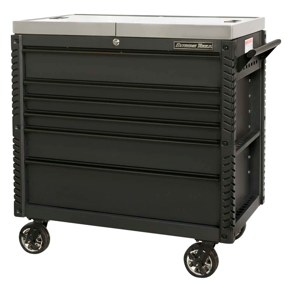 Black 41 Inch Tool Cart By Extreme Tools With A Stainless Steel Top, Five Closed Drawers, A Side Handle And Mounted On Casters
