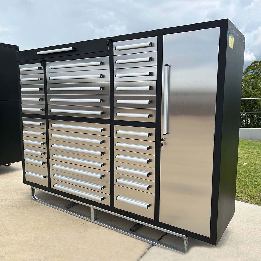 Black And Stainless Steel Tool Cabinet With Many Drawers And A Tall Locker Door