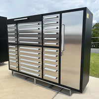 Black And Stainless Steel Tool Cabinet With Many Drawers And A Tall Locker Door