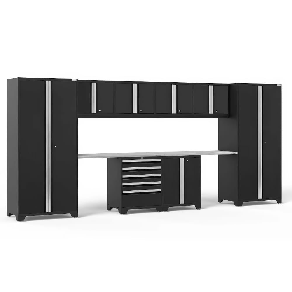 Black Garage Storage System With Tall Cabinets Overhead Wall Units And A Central Workbench Featuring A Stainless Steel