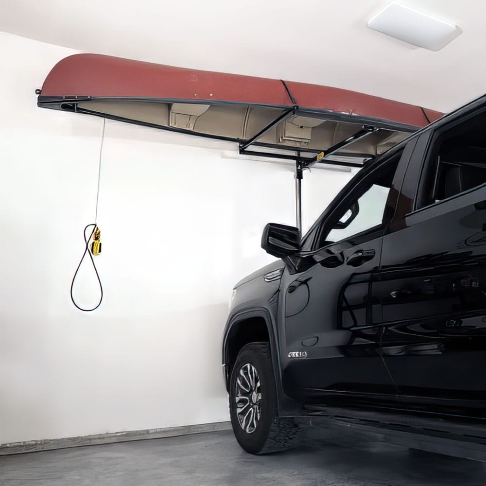Black Pickup Truck Parked In A Clean Garage Featuring A Red Canoe Mounted On Top Shelf Storage Garage Rafter Storage