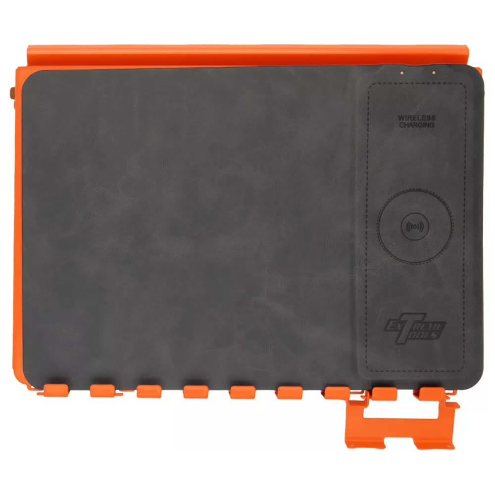 Black Wireless Charging Pad With The Extreme Tools Logo On The Bottom Right Corner And Orange Trim On The Top And Bottom Edges