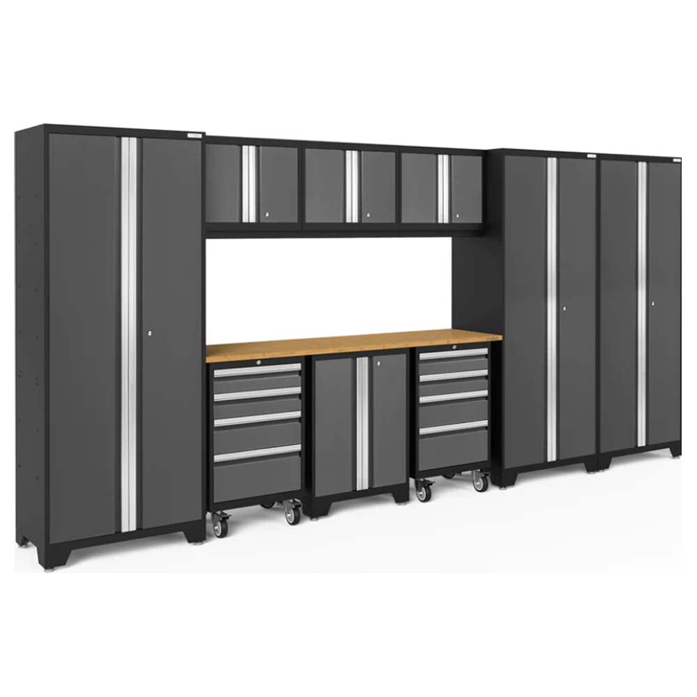 Bold Series 10 Piece Cabinet Set Featuring Two Tall Cabinets, A Wooden Workbench, Two Sets Of Drawers, A Cabinet On Wheels, And Four Overhead Cabinets