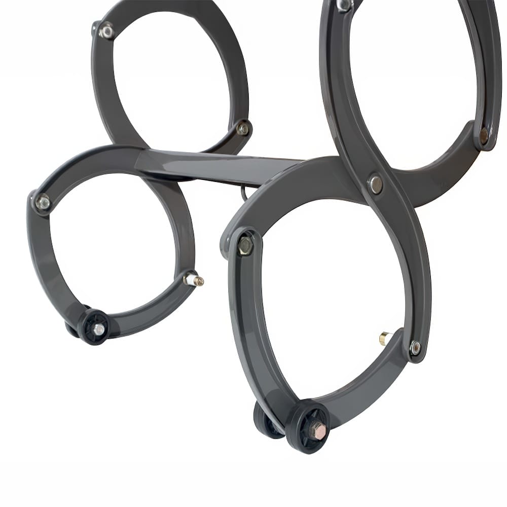 Bottom Section Of A Retractable Attic Ladder With Circular Scissor-Style Joints And Protective Caps On The Feet