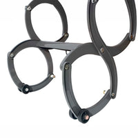 Bottom Section Of A Retractable Attic Ladder With Circular Scissor-Style Joints And Protective Caps On The Feet
