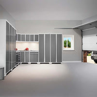 Bright Garage With L Shaped Gray Cabinetry White Trim Open Garage Door And Spacious Epoxy Floor