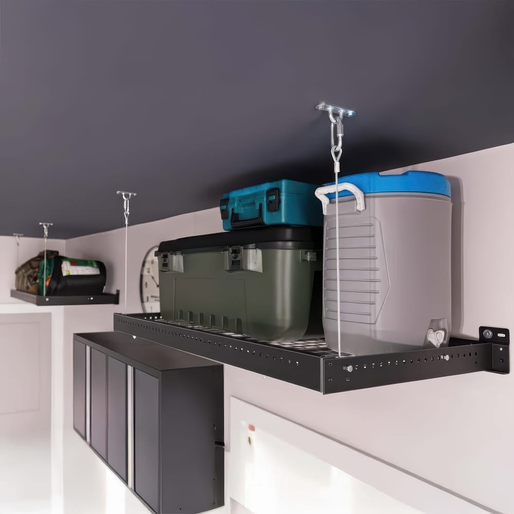 Ceiling-Mounted Hanging Shelves Suspend Toolboxes And A Cooler Above Wall Cabinets In A Modern Garage