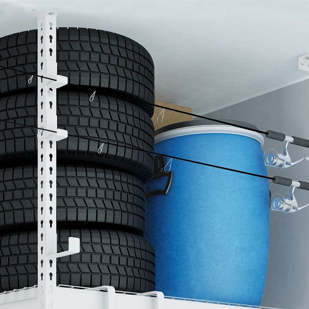Ceiling Mounted Storage Rack Holding Several Stacked Tires And A Large Blue Container With Fishing Rods Stored On Versarac Hooks 