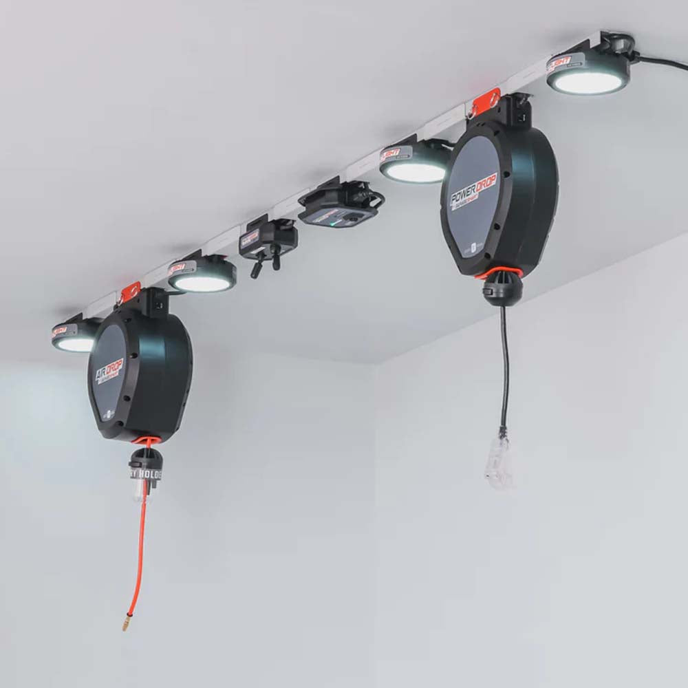 Ceiling Mounted Track System Equipped With Multiple Units Including Lighting And Power Modules