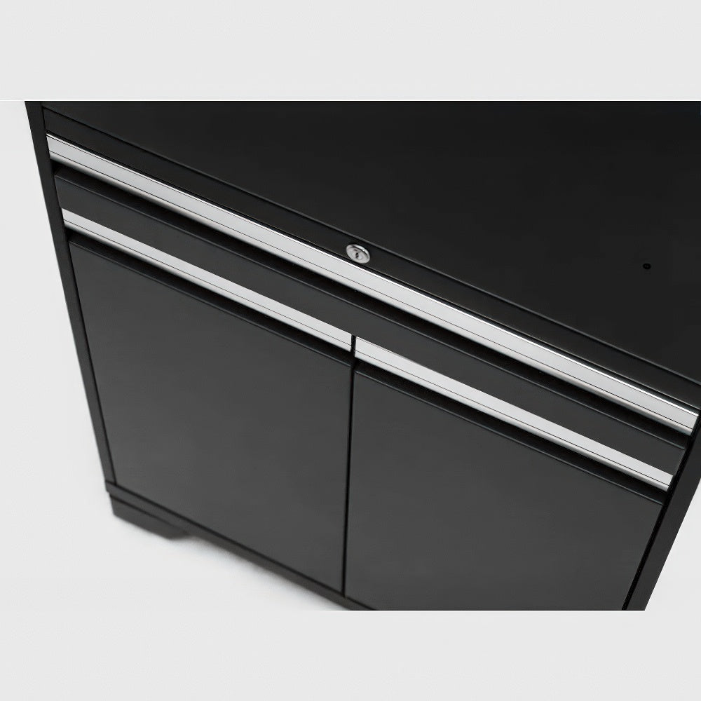 Close-Up Angled View Of A Sleek Black Cabinet With Two Doors And A Top Lockable Drawer Featuring Horizontal Silver Handles