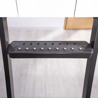 Close-Up Of A Black Metal Ladder Step With Multiple Round Anti-Slip Studs
