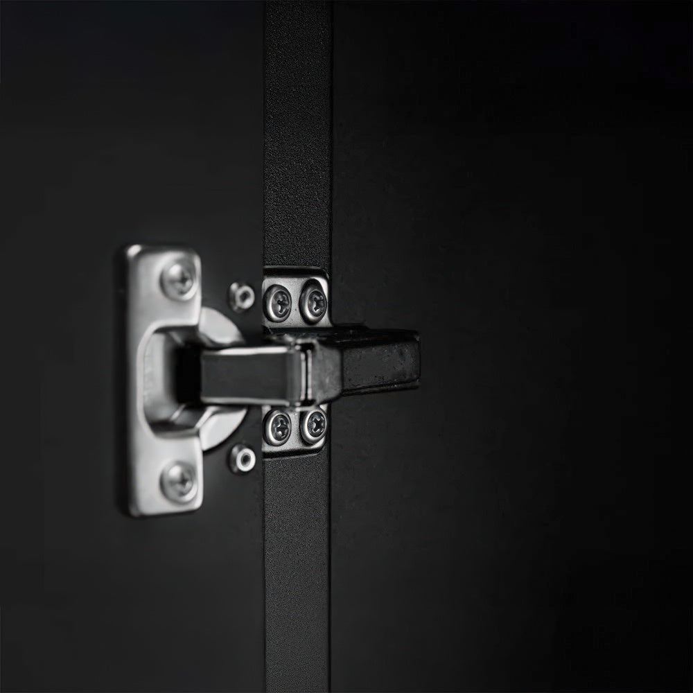Close-Up Of A Metal Cabinet Hinge Securely Fastened With Multiple Screws Against A Matte Black Interior Surface