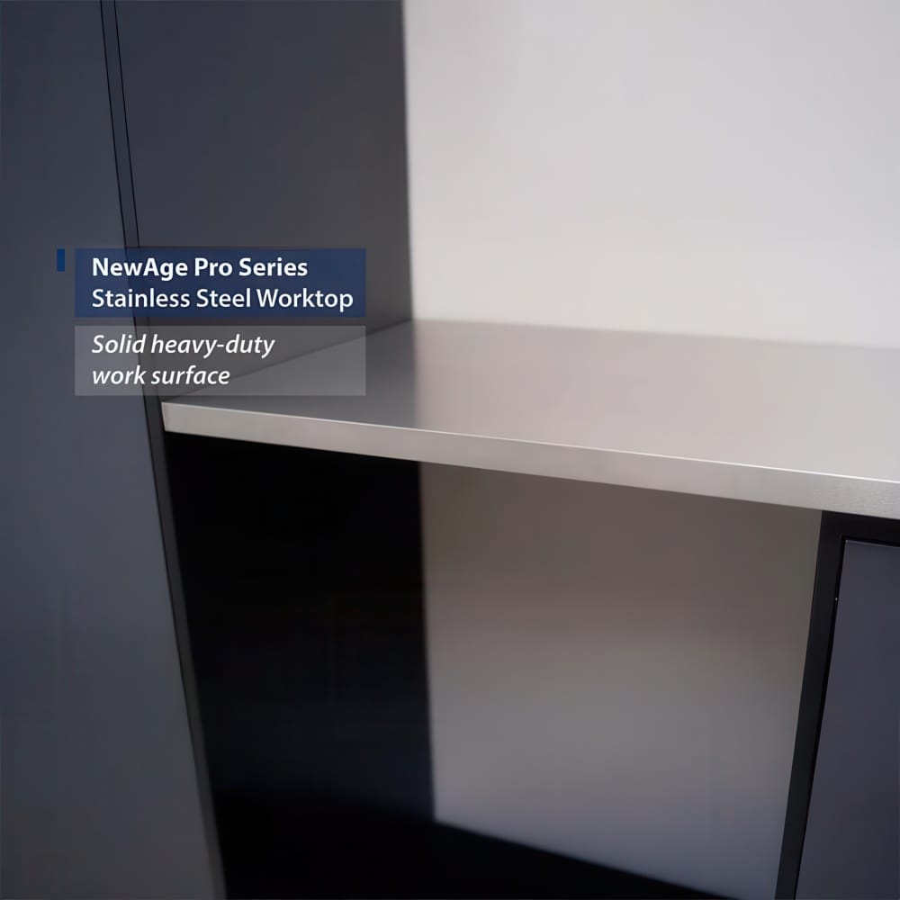 Close-Up Of A NewAge Pro Series Stainless Steel Worktop Showing A Solid Heavy-Duty Work Surface Between Dark Cabinets