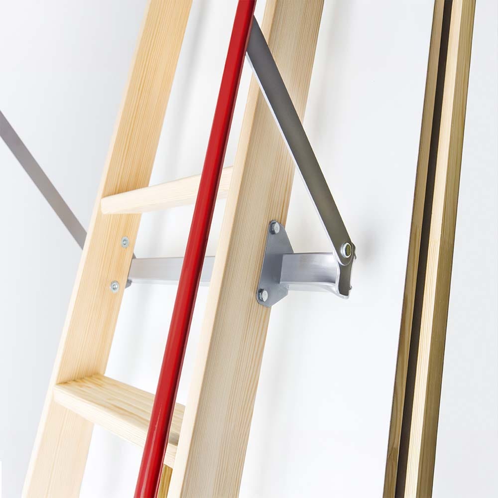Close-Up Of A Wooden Attic Ladder Featuring A Red Handrail And Metal Support Arm Securely Fastened To The Hatch Door
