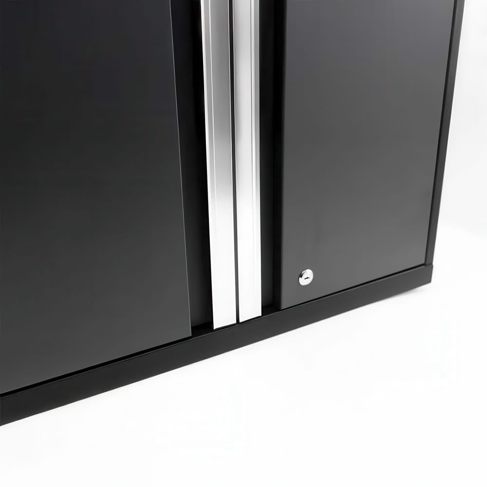 Close-Up Of Black Cabinet Doors With Silver Vertical Handles And Key Lock On A White Background