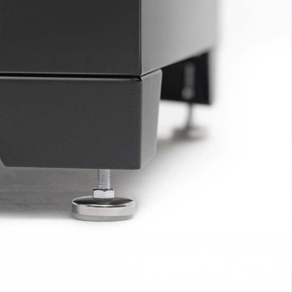 Close-Up Of The Adjustable Leveling Feet On The Bottom Of A Black Metal Cabinet