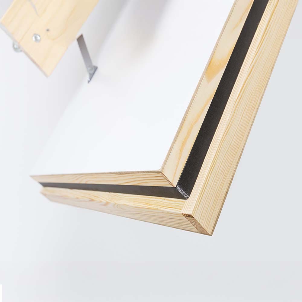 Close-Up Of The Corner Of An Attic Ladder s Insulated Hatch Door