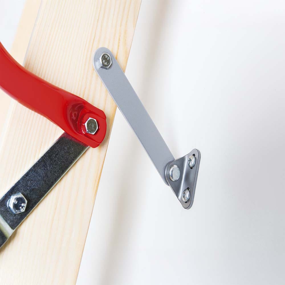 Close-Up Of The Metal Support Arm And Red Safety Handrail Securely Fastened To The Wooden Section Of A Foldable Attic Ladder