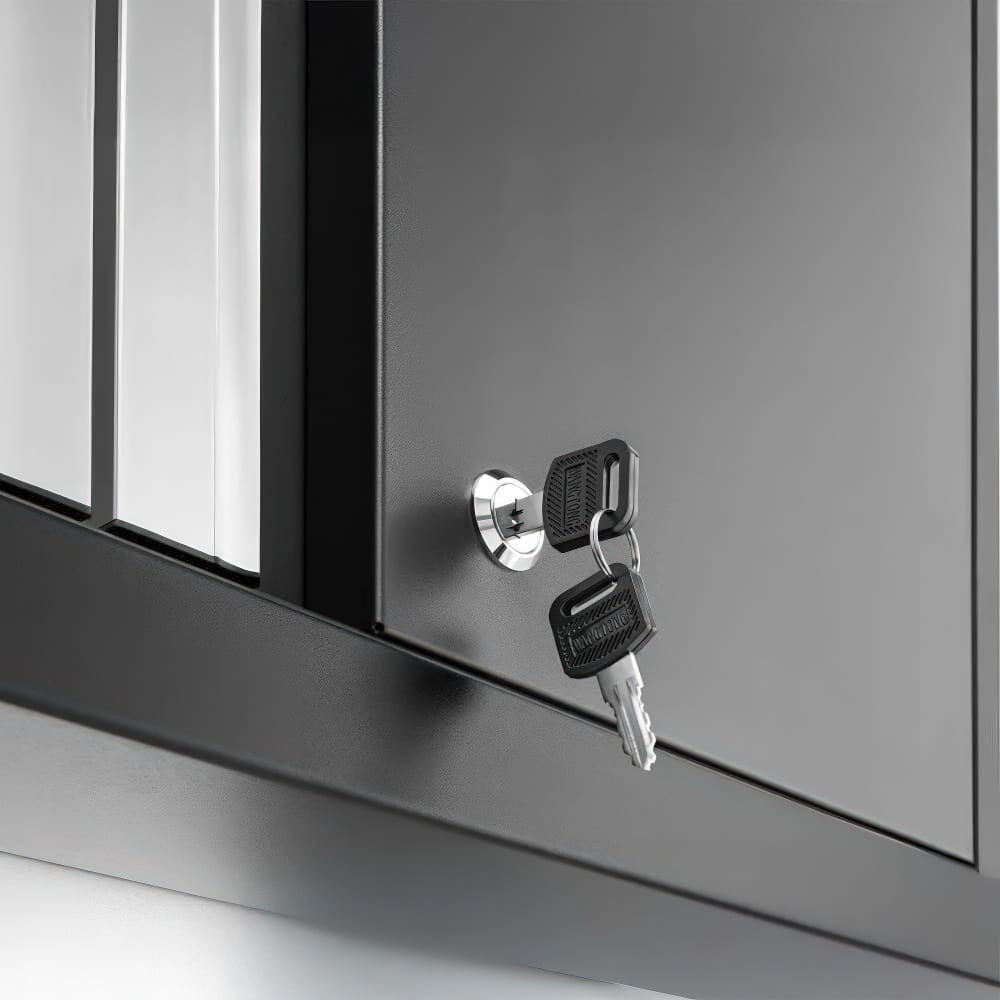 Close-Up Shot Of A Black Cabinet Door Shows A Chrome Lock With Two Inserted Keys