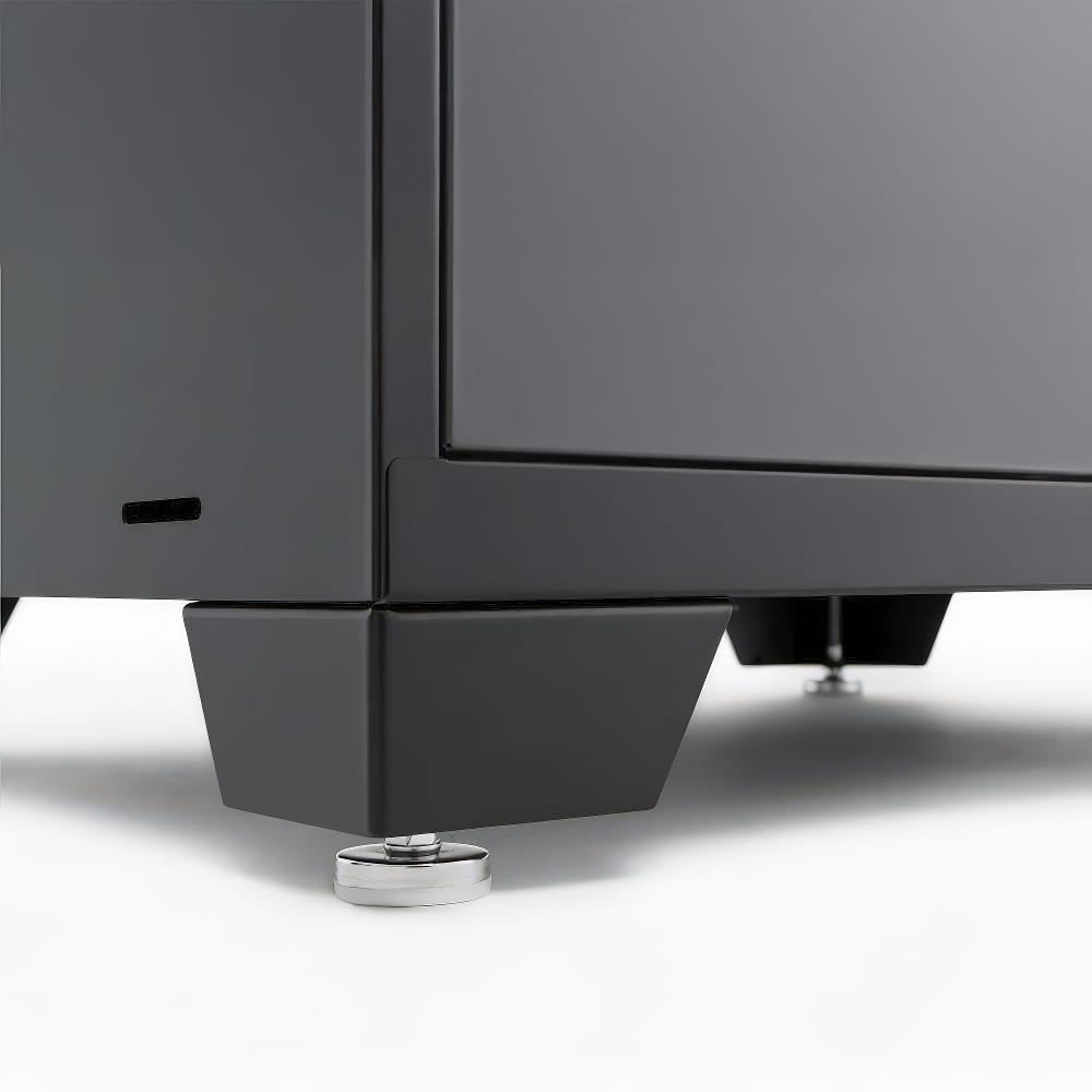 Close-Up View Of A Black Cabinet Corner With Sturdy Metal Feet And Adjustable Leveling Pads