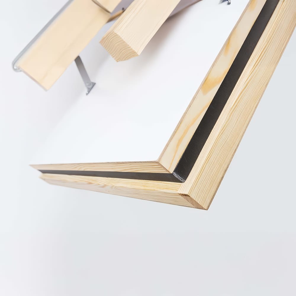 Close-Up View Of The Corner Of An Attic Ladder s Insulated Door Panel