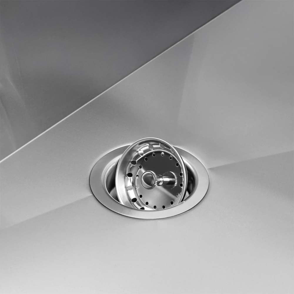 Close Up Of A Stainless Steel Sink Drain With Removable Strainer Basket