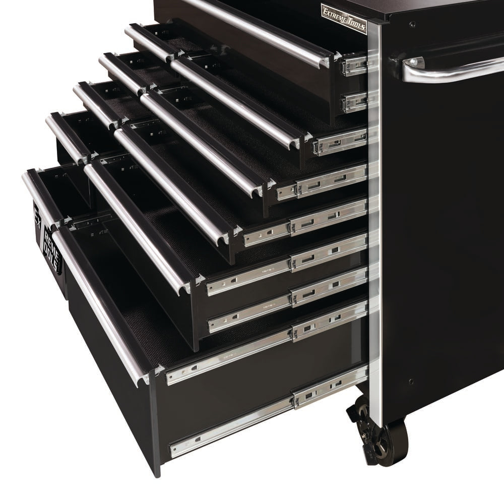 Close Up Of The Side View Of A Black Extreme Tools Roller Cabinet With Multiple Drawers Open