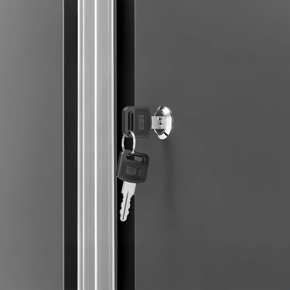 Close Up View Of A Locked Cabinet With A Key Inserted In A Chrome Cylinder Lock