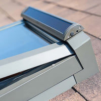 Close Up View Of A Roof Window With Solar Powered Panel And Modern Framing
